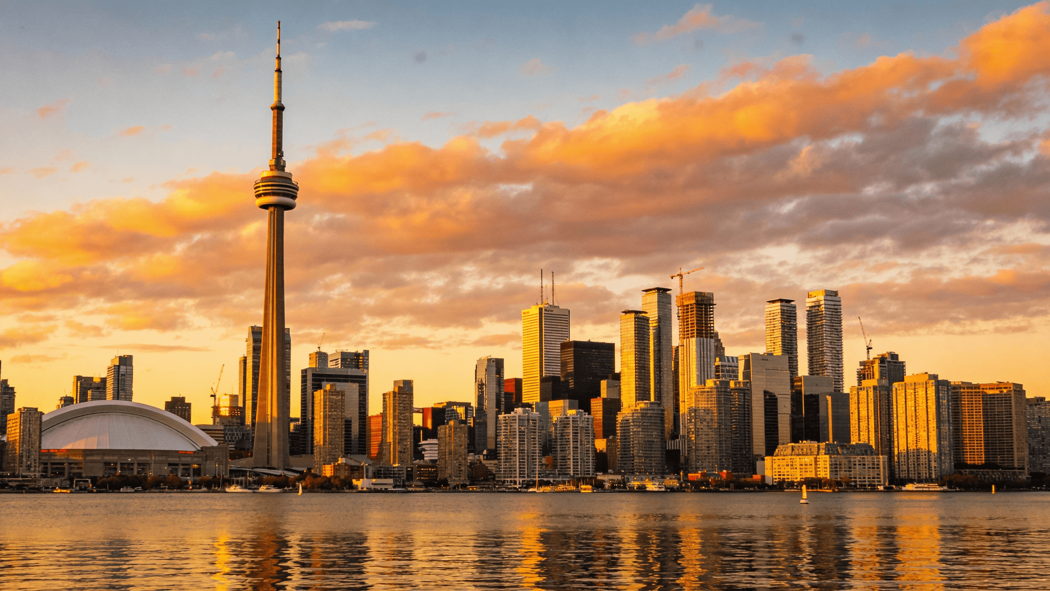 Toronto’s skyline at sunset, seen from the lake